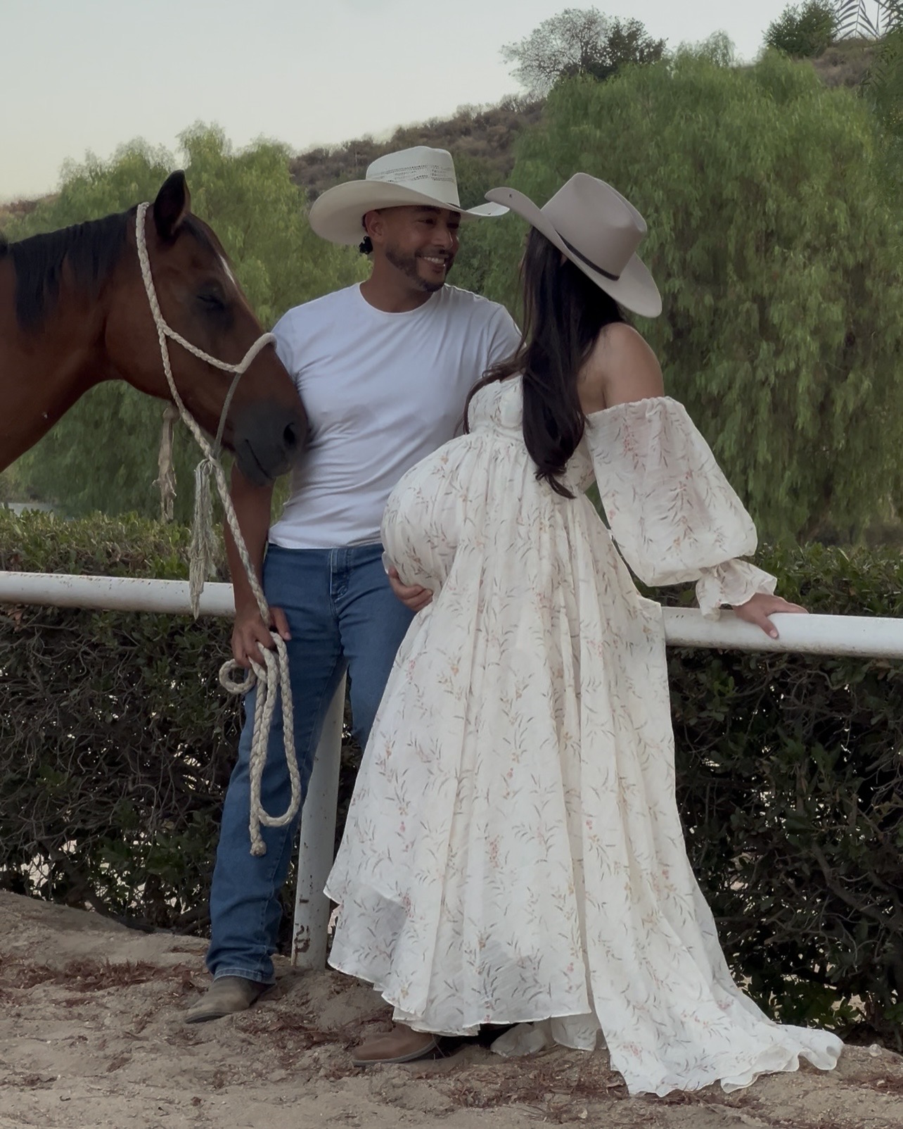 Dione and his wife beside their horse